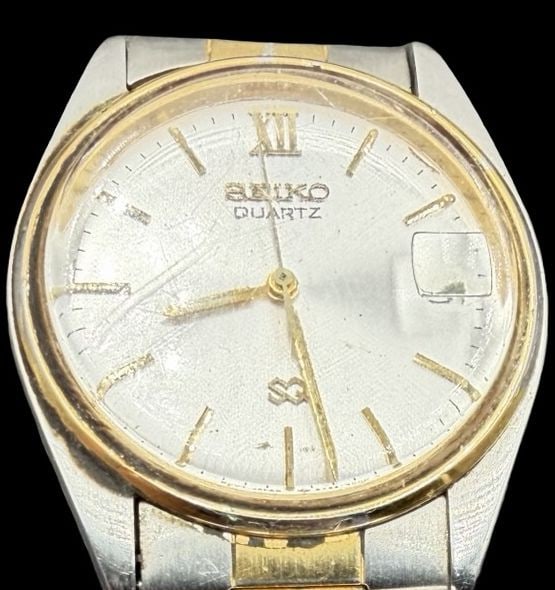 Gorgeous Vintage SEIKO Stainless Steel Two Tone Quartz Watch: Good vintage condition w/ patina and wear according to age and use, see pictures. Measures approx. 1" long and 1" wide. Marked for SEIKO. Watch isn't working.