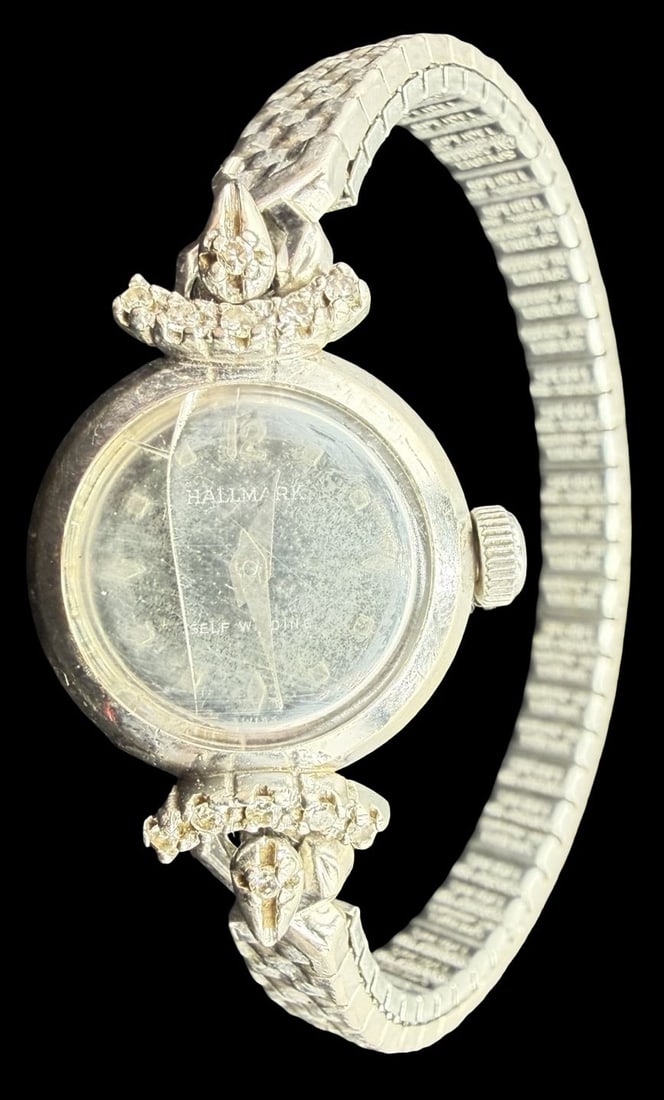 Vintage HALLMARK 10K Gold Filled Ladies Watch: Good vintage condition w/ patina and wear according to age and use, see pictures. Dial measures approx. 1/2" long and 1/2" wide and weighs ca. 21.44 grams. Marked for HALLMARK. The timepiece is functi