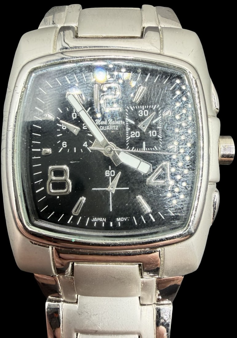 Gorgeous Vintage MARK NAIMER Stainless Steel Silver Tone & Black Dial Quartz Watch: Good vintage condition w/ patina and wear according to age and use, see pictures. Measures approx. 1 1/4" long and 1 1/4" wide. Marked for MARK NAIMER. Watch isn't working.