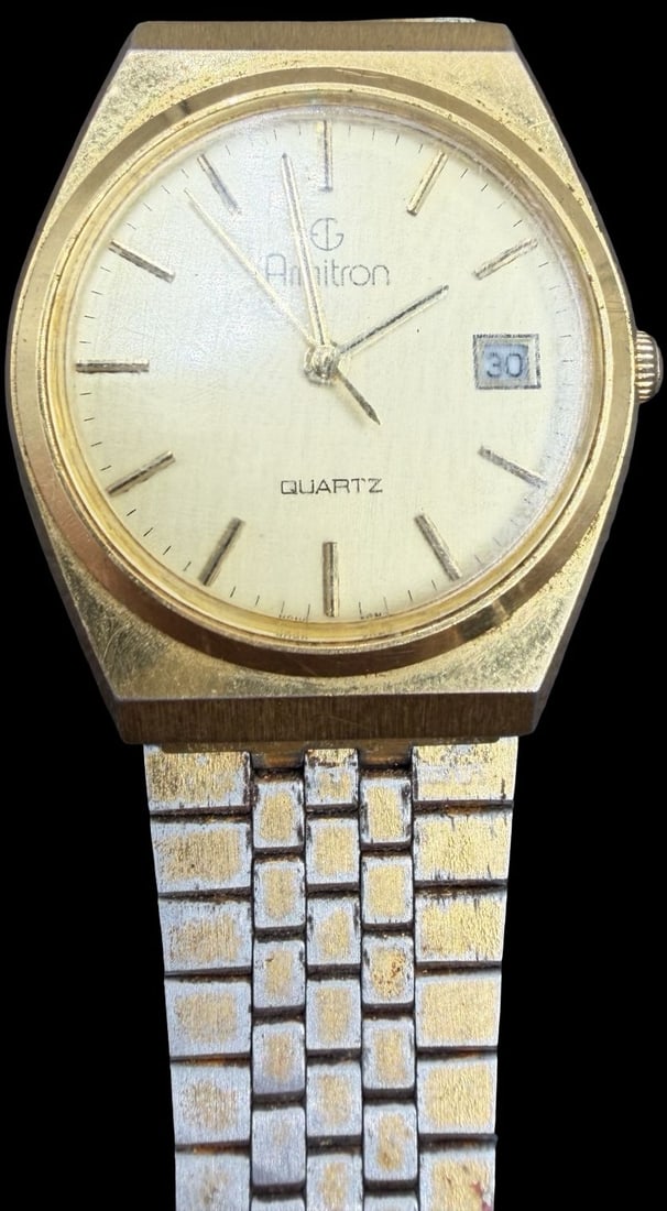Gorgeous Vintage ARMITRON Stainless Steel Gold Tone Quartz Watch: Good vintage condition w/ patina and wear according to age and use, see pictures. Measures approx. 1" long and 1" wide. Marked for ARMITRON. Watch isn't working.