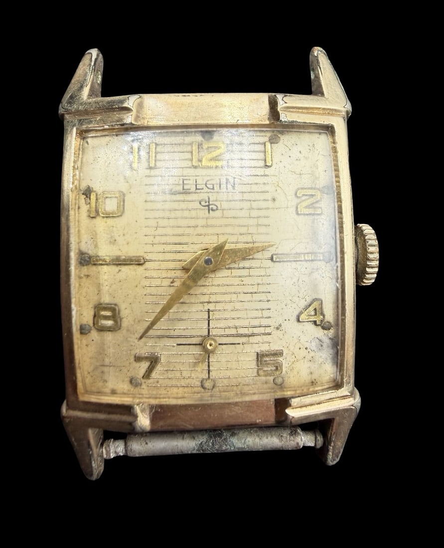 Vintage Mid-Century ELGIN Gold Filled Wristwatch: Good vintage condition w/ patina and wear according to age and use, see pictures. Dial measures approx. 1" long and 1" wide and weighs ca. 18.45 grams. Marked for ELGIN. The timepiece is working. Miss