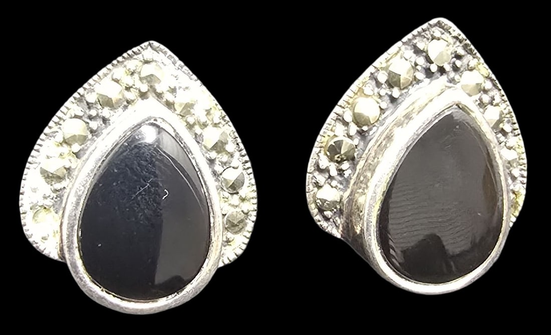 Pair of Vintage Mid-Century Sterling Silver, Marcasite & Black Onyx Earrings: Good vintage condition w/ patina and wear according to age and use, see pictures. Each measures approx. 1 1/2" high and they jointly weigh ca. 6.5 grams. Marked Sterling Silver.