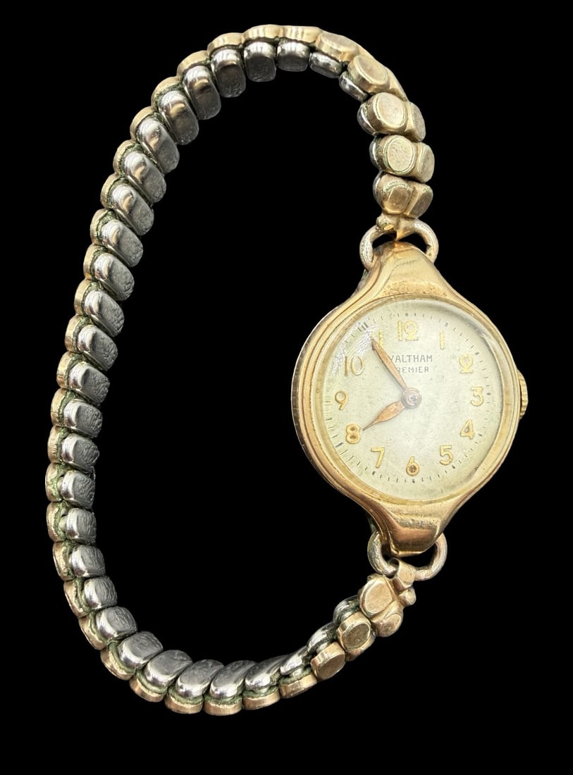 Vintage Mid-Century WALTHAM Gold Filled Ladies Watch: Good vintage condition w/ patina and wear according to age and use, see pictures. Dial measures approx. 3/4" long and 3/4" wide and weighs ca. 21.20 grams. Marked for WALTHAM. The timepiece is working