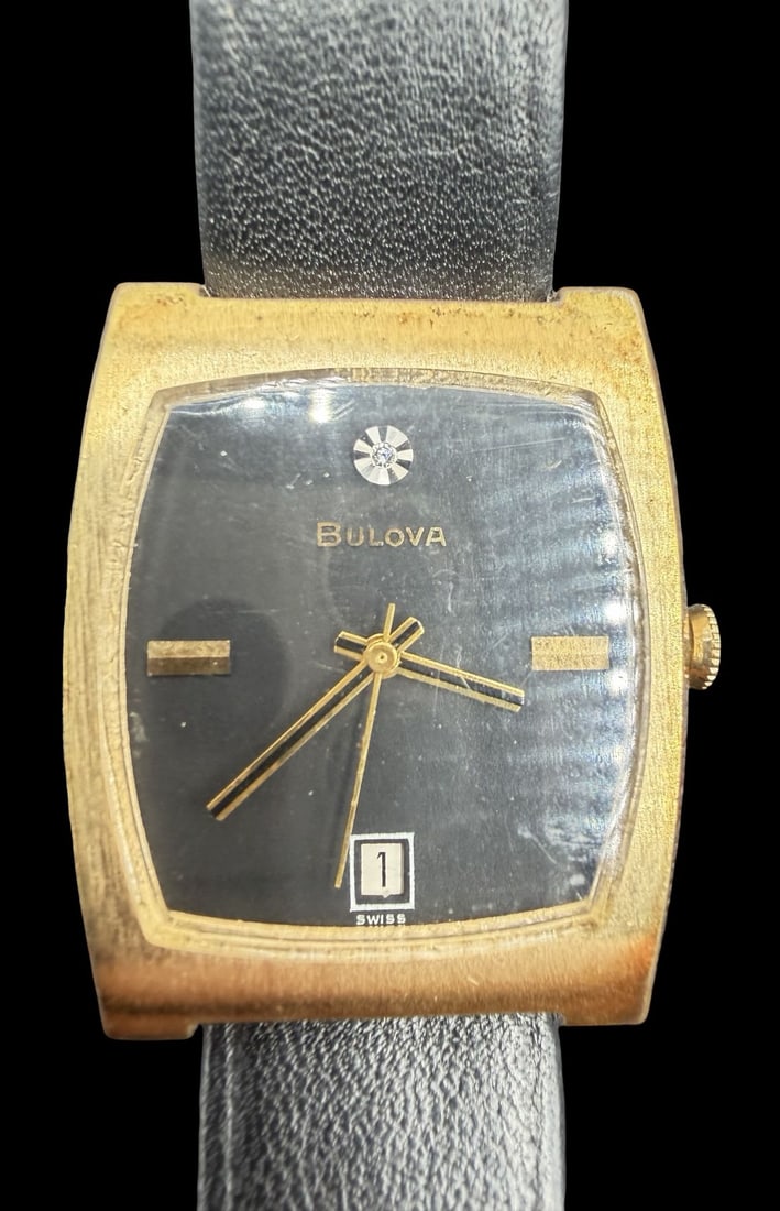 Amazing Vintage BULOVA Stainless Steel, Black Dial & Clear Rhinestone Watch w/ Box: Good vintage condition w/ patina and wear according to age and use, see pictures. Dial measures approx. 1" long and 3/4" wide and weighs ca. 34.1 grams. Marked for BULOVA. The timepiece is working.