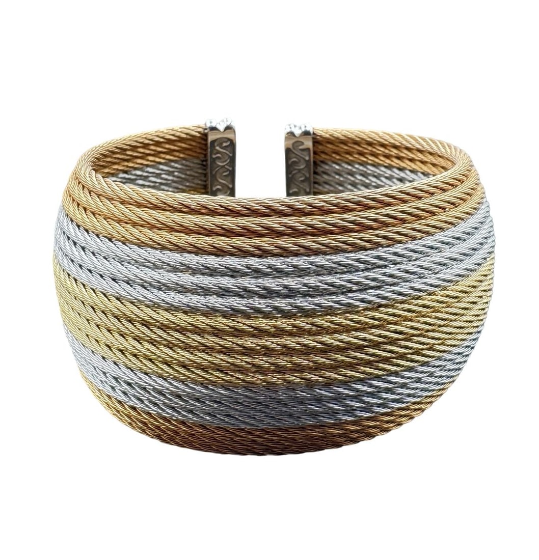 ALOR Women's Cable 18K Gold & Stainless Steel Multi-Row Twist Cuff Bracelet: Good vintage condition w/ patina and wear according to age and use, see pictures. Measures approx. 7" in inner circumference, 2.75" in inside diameter and 1.5" wide and weighs ca. 83.69 grams. Comes w