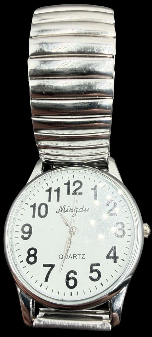 Gorgeous Vintage MINGDU Stainless Steel & Silver Dial Quartz Watch: Good vintage condition w/ patina and wear according to age and use, see pictures. Measures approx. 1 1/4" long and 1 1/4" wide and weighs ca. 44.99 grams. Marked for MINGDU. Watch isn't working. Strap