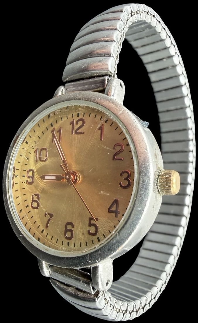 Amazing Vintage Stainless Steel Watch & Strap is Stretchable: Good vintage condition w/ patina and wear according to age and use, see pictures. Measures approx. 3/4" long and 3/4" wide and weighs ca. 27.21 grams. Watch isn't working.