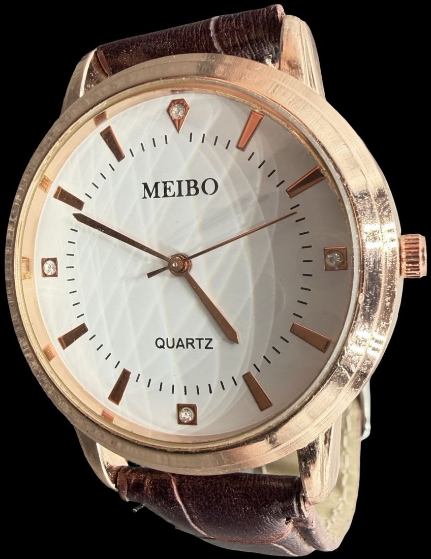Gorgeous Vintage MEIBO Stainless Steel & Gold Tone Watch: Good vintage condition w/ patina and wear according to age and use, see pictures. Measures approx. 1 1/4" long and 1 1/4" wide and weighs ca. 49.9 grams. Marked for MEIBO. Working.