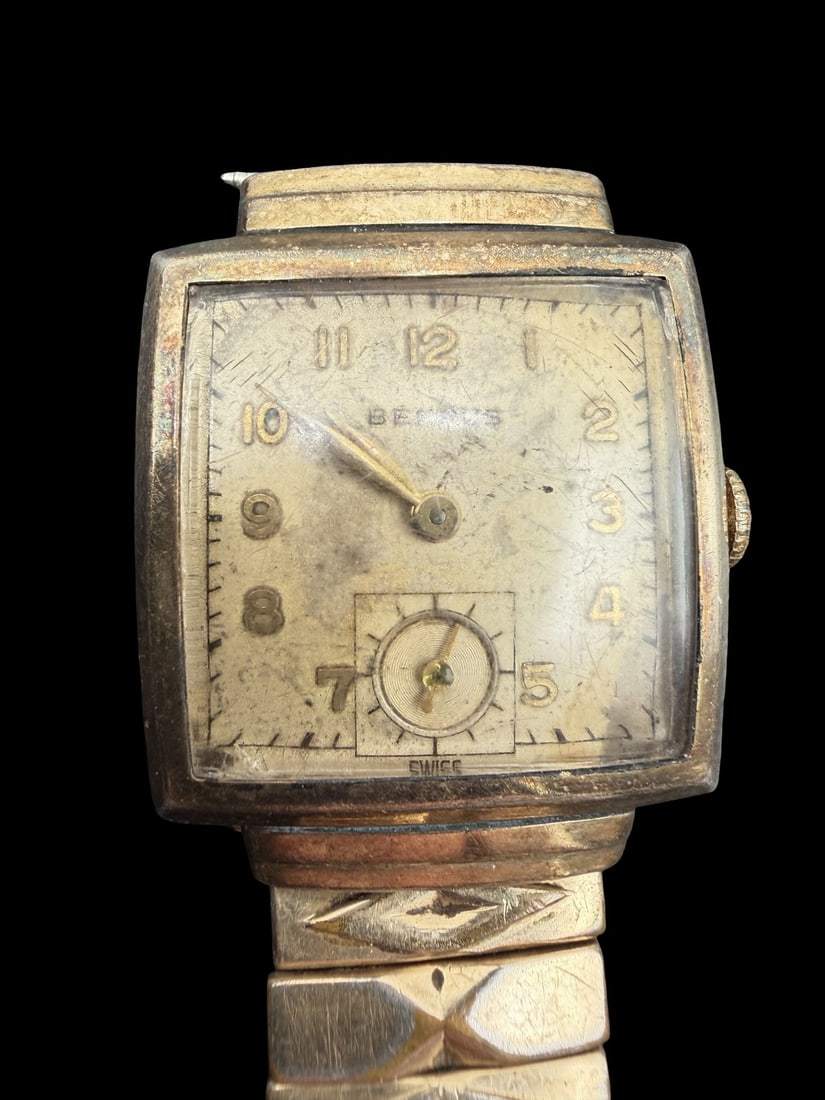 Vintage Mid-Century BENRUS Gold Filled Wristwatch: Good vintage condition w/ patina and wear according to age and use, see pictures. Dial measures approx. 1/2" long and 1/2" wide and weighs ca. 11.22 grams. Not Working. Marked BENRUS.