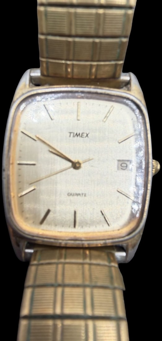 Gorgeous Vintage TIMEX Stainless Steel Gold Tone Quartz Watch: Good vintage condition w/ patina and wear according to age and use, see pictures. Measures approx. 1" long and 1" wide and weighs ca. 70.73 grams. Marked for TIMEX. Watch isn't working. Strap is Stret
