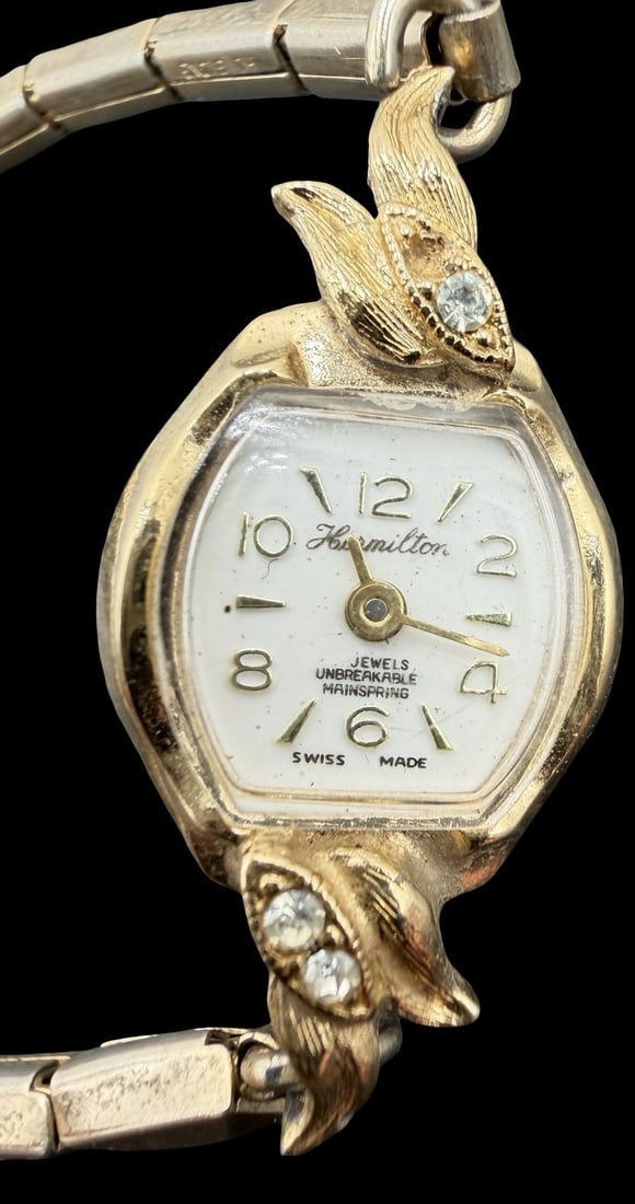 Gorgeous Ornate Vintage HAMILTON Stainless Steel Gold Tone & Clear Rhinestones Women's Watch: Good vintage condition w/ patina and wear according to age and use, see pictures. Measures approx. 1/2" long and 1/2" wide and weighs ca. 13.59 grams. Marked for HAMILTON. Watch isn't working. Missing