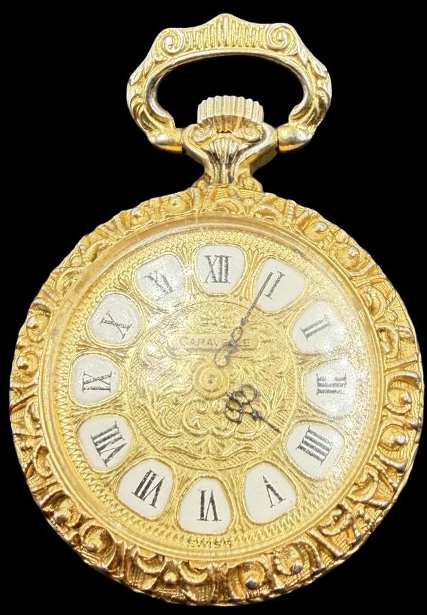 Stunning Ornate Vintage Gilt Sterling Silver CARAVELE Watch Pendant Charm: Good vintage condition w/ patina and wear according to age and use, see pictures. Measures approx. 1 1/2" long and 1" wide and weighs ca. 20.5 grams. Tested for Sterling Silver. Marked CARAVELE