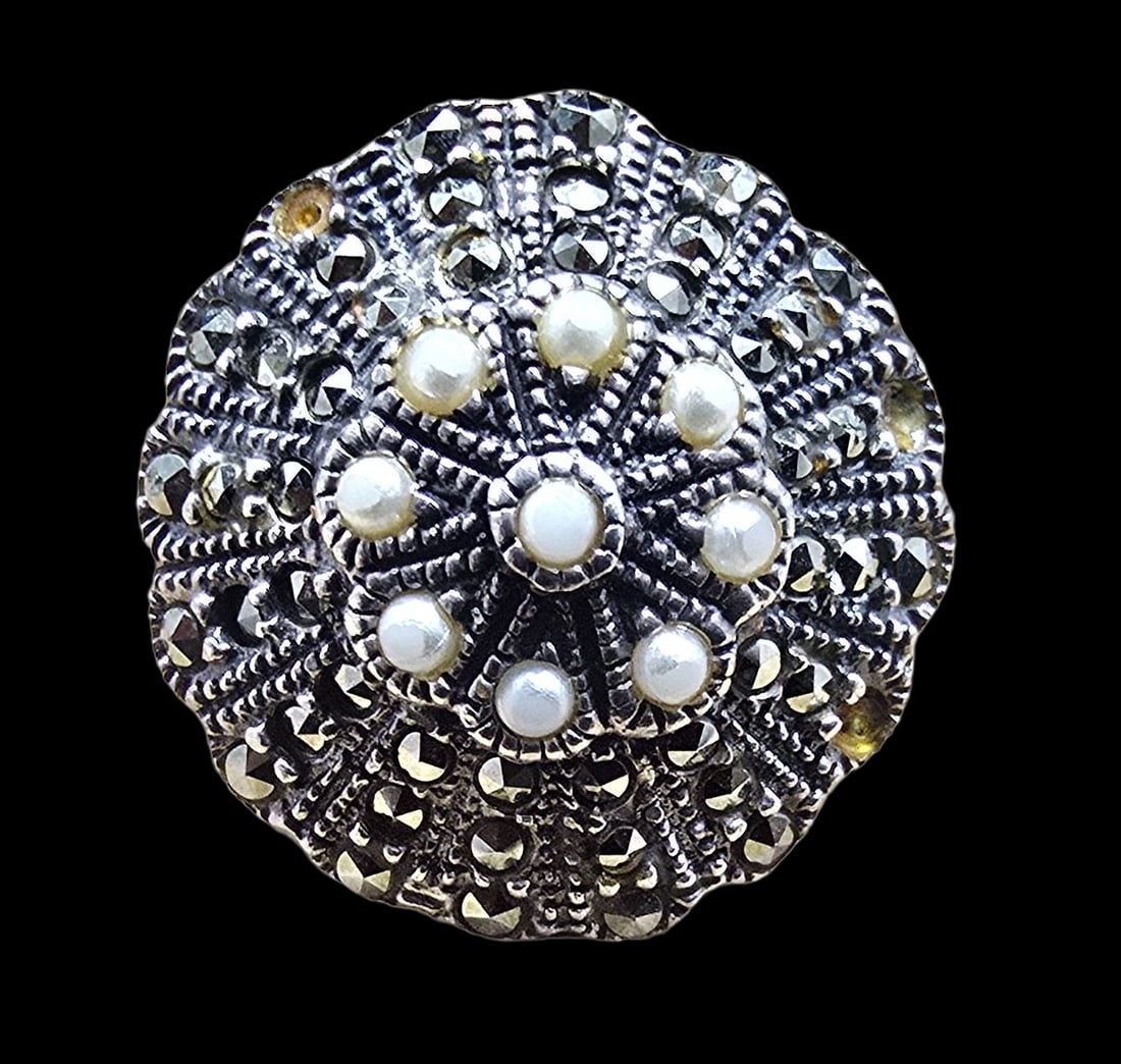 Beautiful Ornate Vintage Sterling Silver, Marcasite & Pearl Ring: Good vintage condition w/ patina and wear according to age and use, see pictures. The ring is a size 7" and weighs ca. 6.5 grams. Marked for Sterling Silver. Missing some Marcasites.