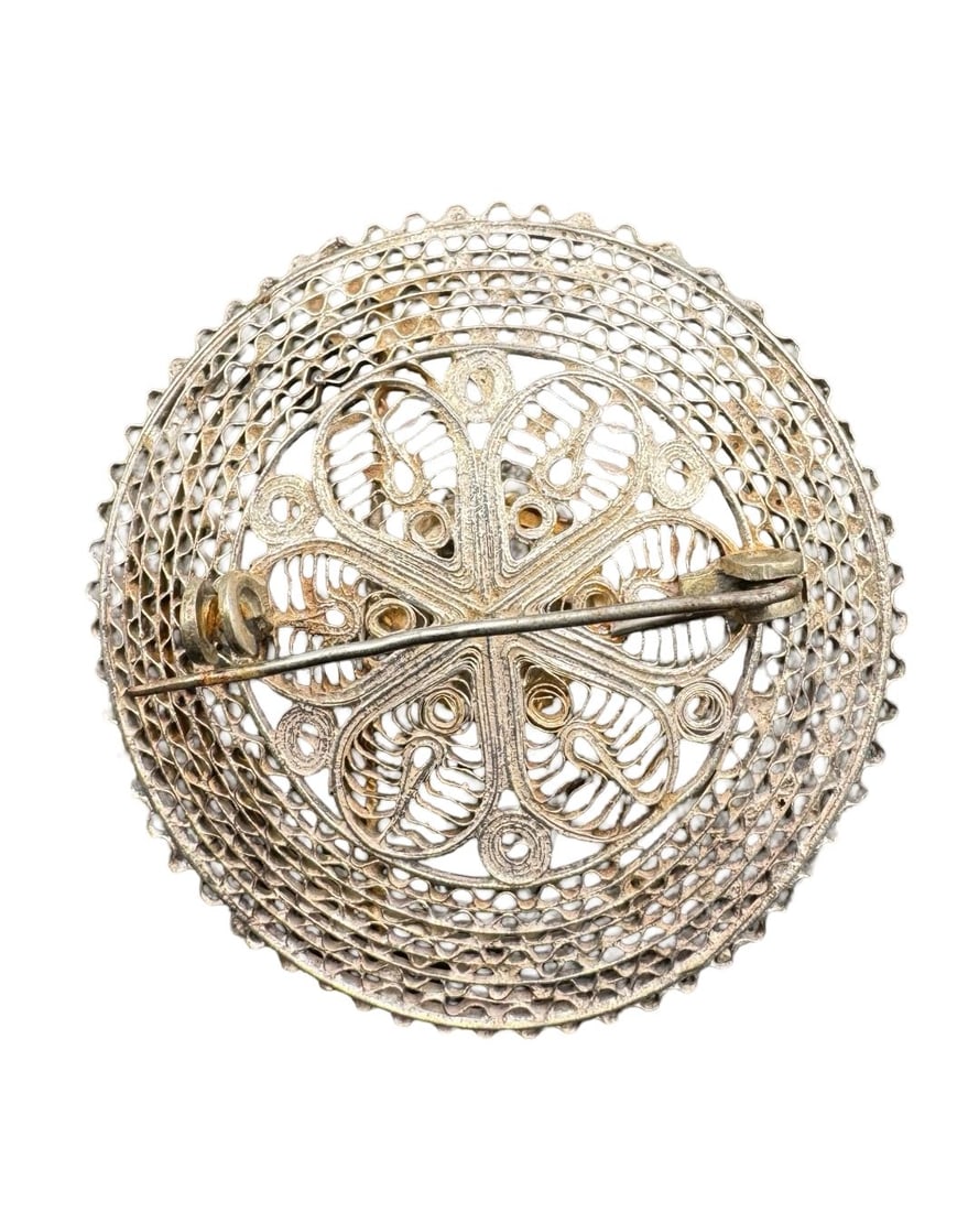 Charming Vintage Sterling Silver Filigree Sombrero Hat Brooch Pin: Very good vintage condition with minor patina according to age. Measures approx. 1.75" long x 1.75" wide. Weighs ca. 9.06 grams. Tested for Sterling Silver.