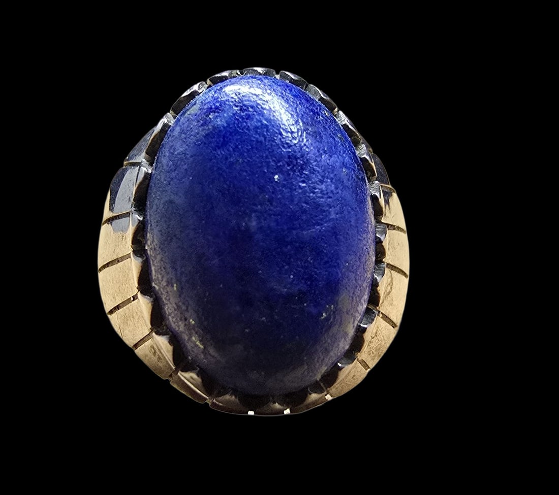 Gorgeous Ornate Vintage Sterling Silver & Blue Gemstone Ring: Very good vintage condition with minor patina according to age. The ring is a size 9.5 and weighs ca. 14 grams. Marked for Sterling Silver.