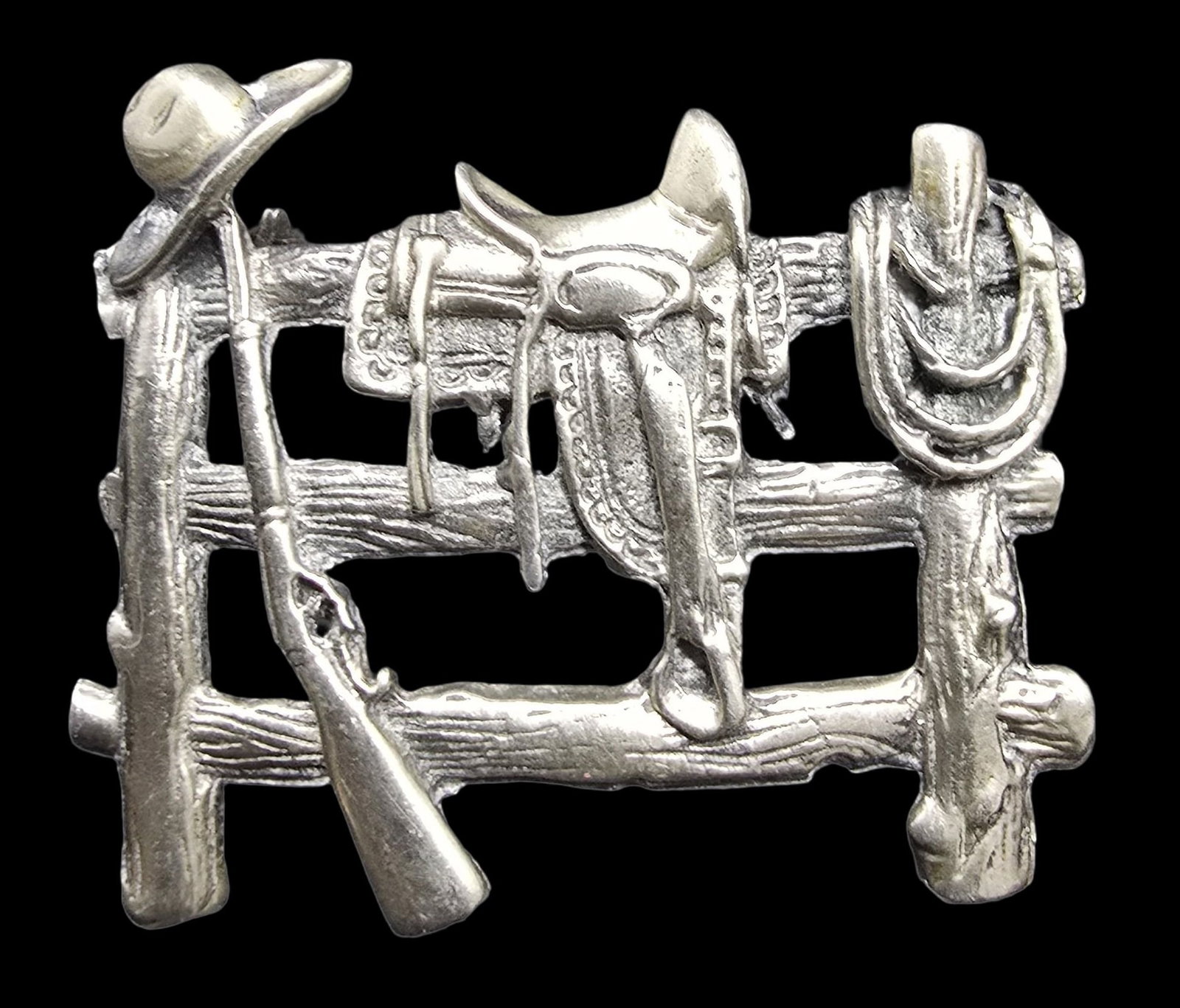 Amazing Vintage Sterling Silver Western Farm Fence /w Saddle & Gun Brooch Pin: Very good vintage condition. with minor patina according to age. Measures approx. 1 1/2" high and 1" wide and weighs ca. 14 grams. Marked for Sterling Silver.