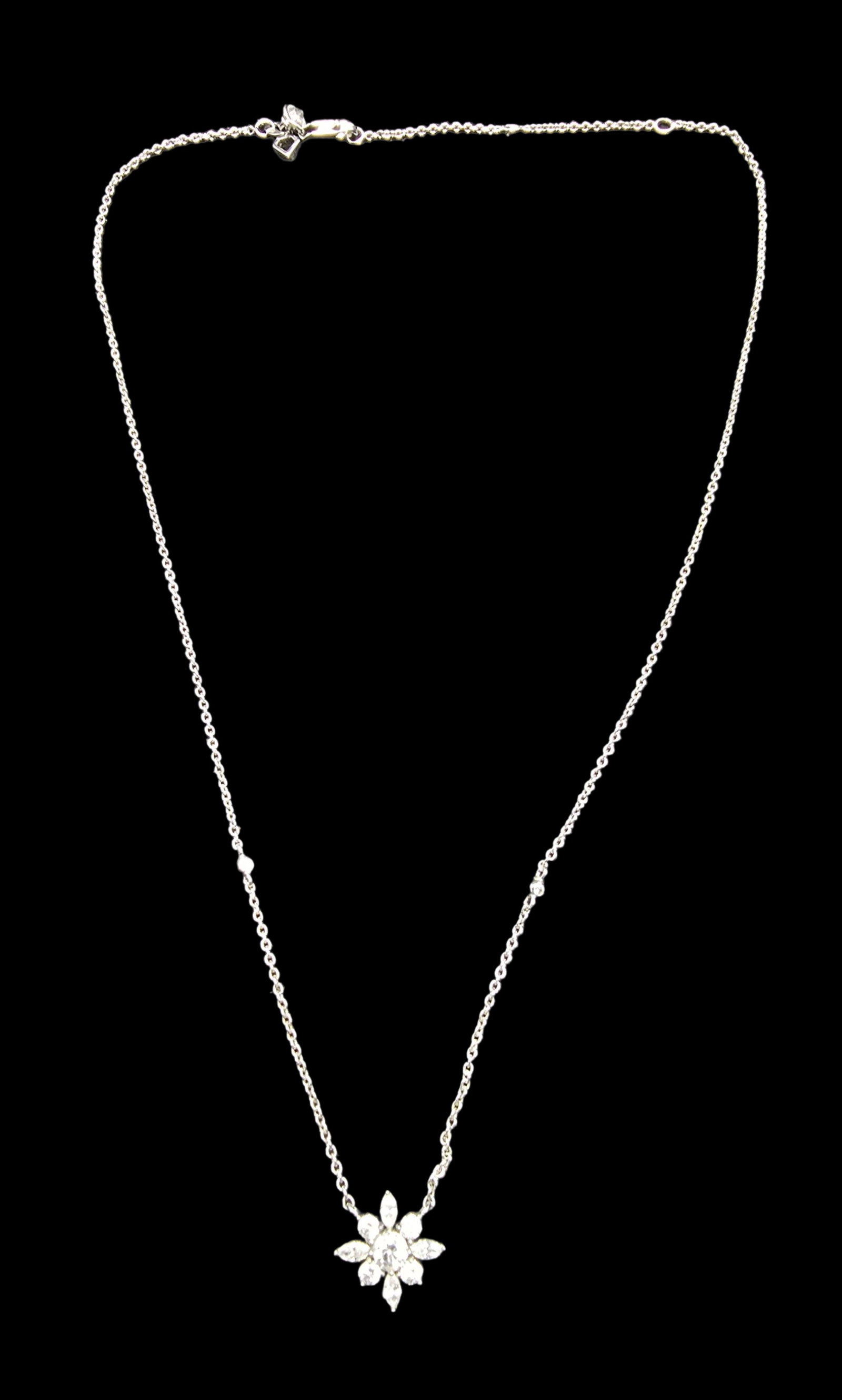 Beautiful Vintage Sterling Silver & Clear Rhinestone Cluster Star Designer Pendant Necklace: Very good vintage condition with minor patina according to age. Measures approx. 18" long and weighs ca. 3.5 grams. Pendant measures approx. 1/2" wide. Marked for Sterling Silver.