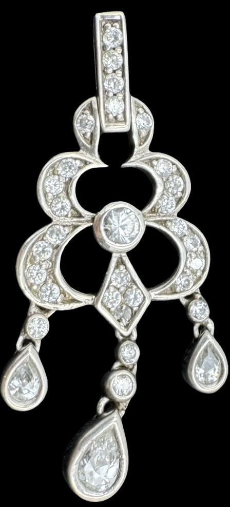 Beautiful Vintage Sterling Silver Cluster & Clear Gemstone Pendant: Very good vintage condition with minor patina according to age. Measures approx. 1 3/4" long x 3/4" wide and weighs ca. 5.3 grams. Marked for Sterling Silver..