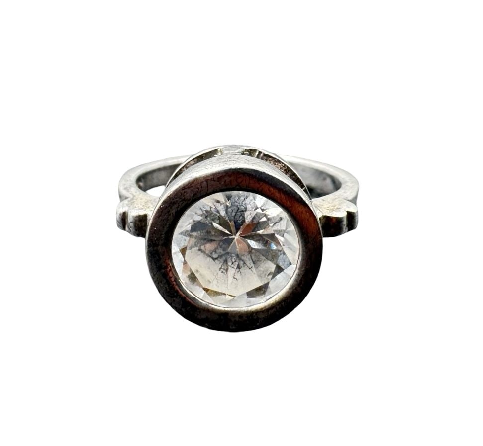 Beautiful Vintage Mid-Century Modern Sterling Silver Clear Quartz Solitaire Ring: Very good vintage condition with minor patina according to age. Measures approx. 3/4" long and 1/2" wide and weighs ca. 4 grams. The ring is a size 5.5. Marked for Sterling Silver.