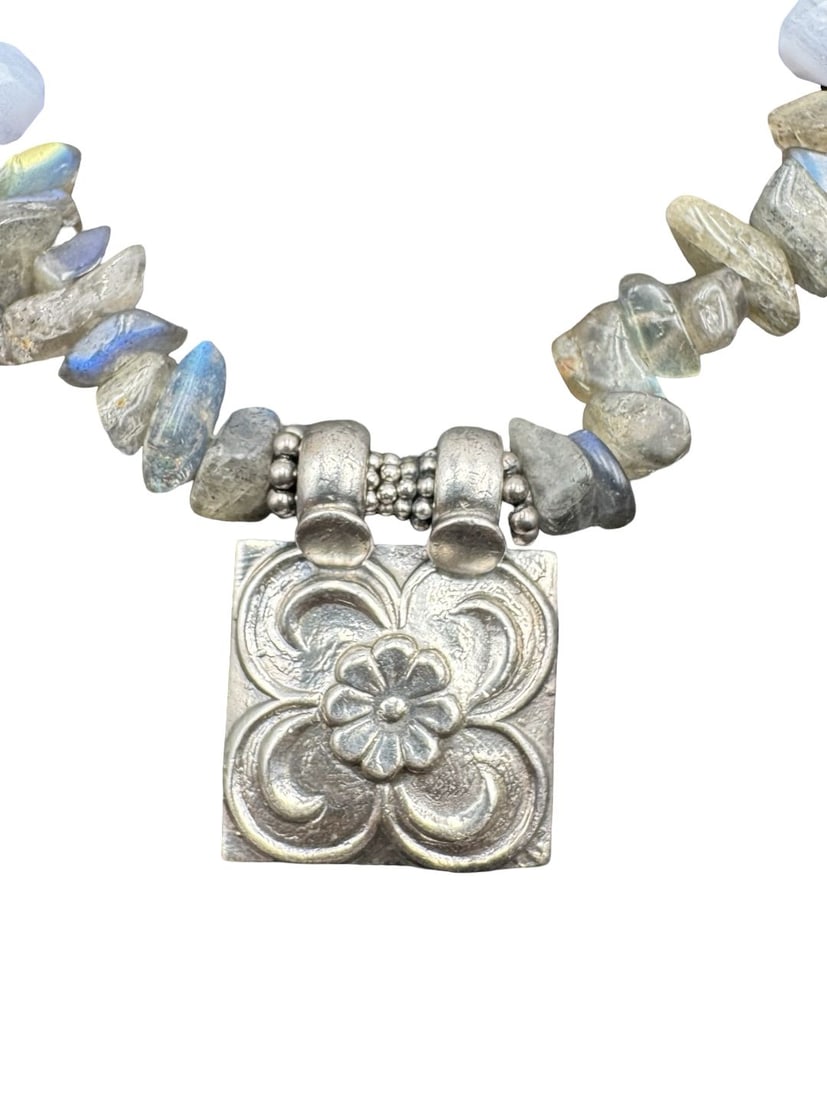 Elegant & Unusual Vintage Sterling Silver Repouss? Flower Medallion on Gemstone Bead Necklace: Very good vintage condition with minor patina according to age. Necklace measures approx. 19" long, 1/2" wide and the pendant measures approx. 3/4" long x 1/2" wide. Weighs ca. 51.75 grams. Marked for