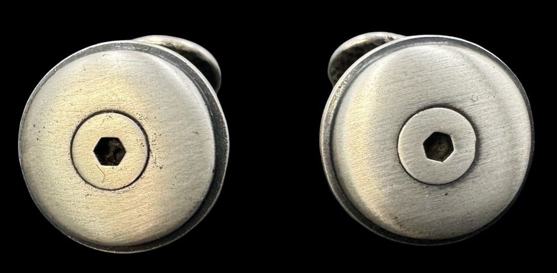 Stylish Vintage Brushed Silver Metal Cufflinks: Very good vintage condition with minor patina according to age. Measures approx. 5/8" in diameter.