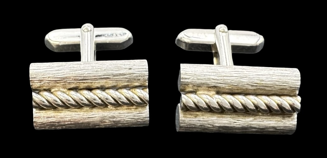 Stylish Vintage Silver Metal Cufflinks: Very good vintage condition with minor patina according to age. Measures approx. 3/4" long x 1/2" wide.