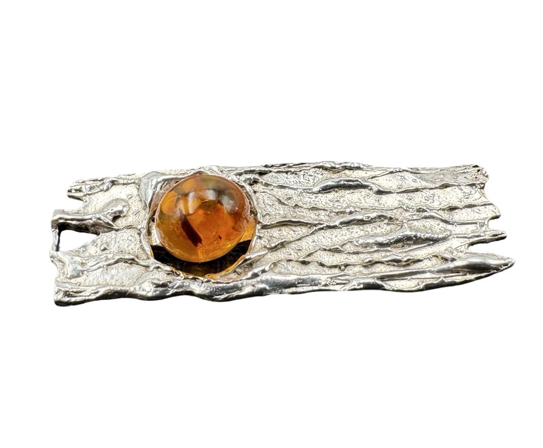 Striking Vintage Mid-Century Brutalist German 835 Silver & Baltic Amber Bark Textured Brooch: Very good vintage condition with minor patina according to age. Measures approx. 2" long x 1/2" wide. Weighs ca. 9.59 grams. Marked for 835 Silver and FISCHLAND.