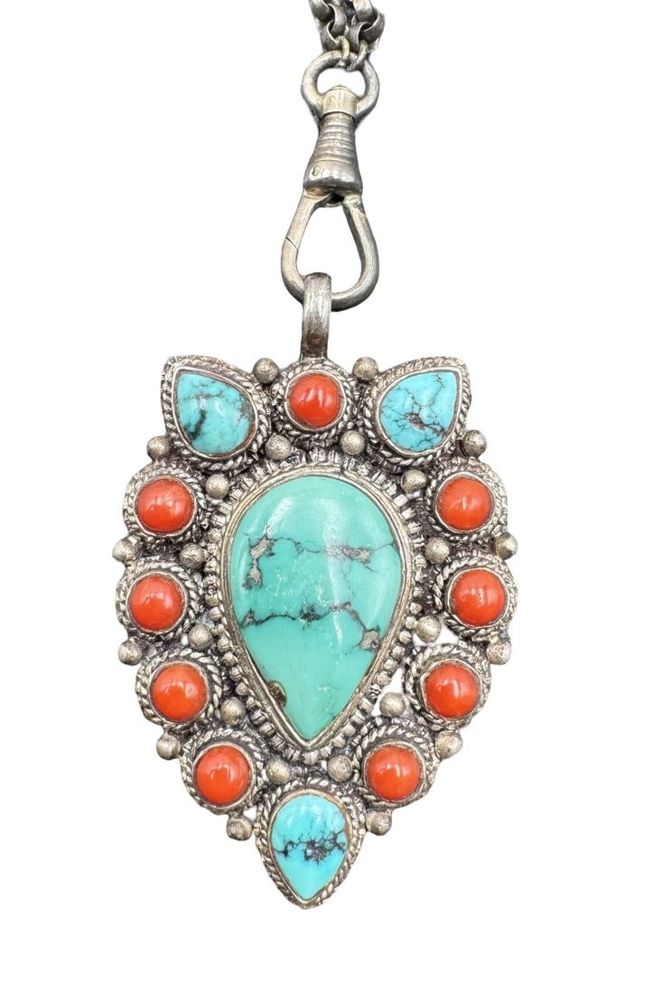 Stunning Vintage Tibetan Sterling Silver Turquoise & Coral Cluster Pendant Necklace: Very good vintage condition with minor patina according to age. Necklace measures approx. 30" long and the pendant measures approx. 1 7/8" long x 1 1/4" wide. Weighs ca. 48.16 grams. Marked for Sterli
