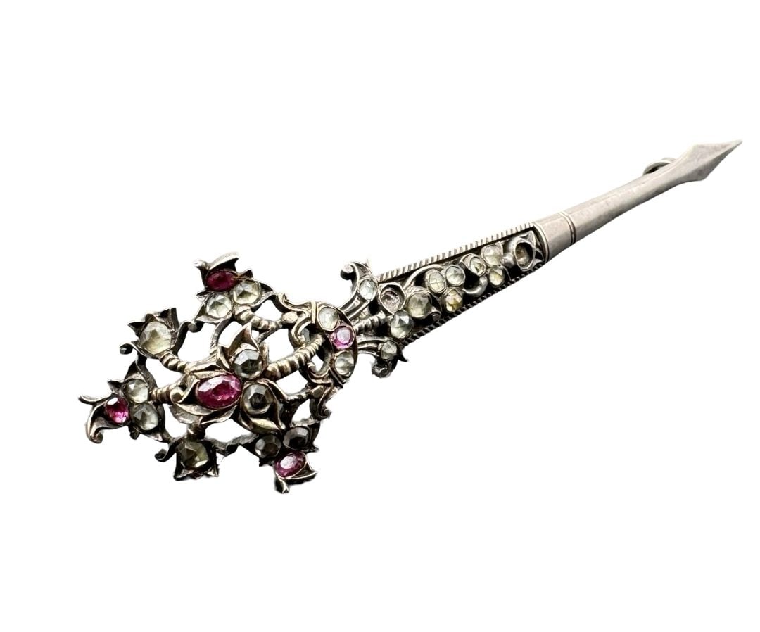 Gorgeous Antique Victorian Sterling Silver & Rose Cut Gemstone Dagger Brooch: Good vintage condition with minor patina according to age; missing 3 stones. Measures approx. 3 3/4" long and 3/4" wide. Weighs ca. 9.80 grams. Tested for Sterling Silver.