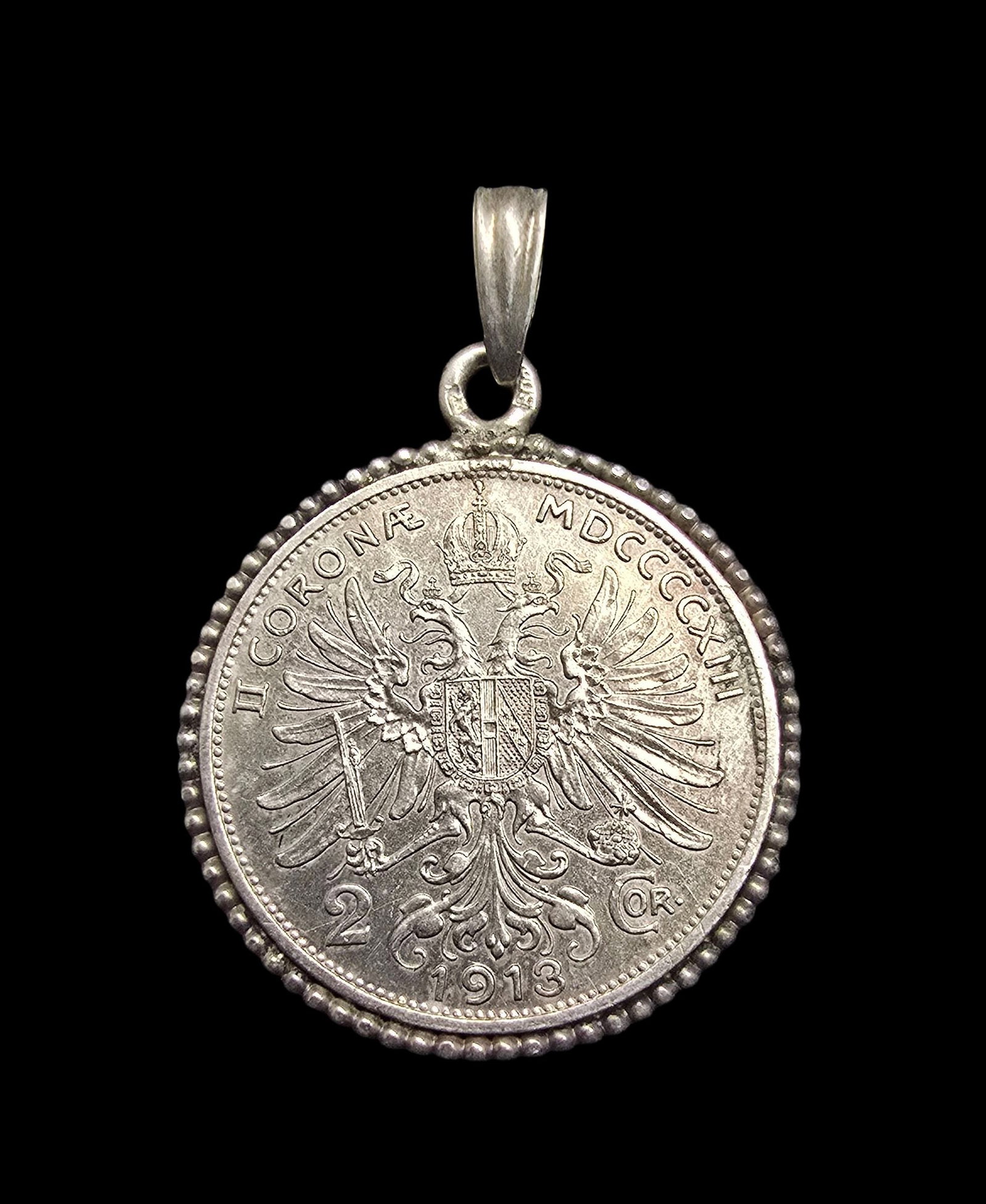 Amazing Vintage 1912 Austrian King Franz Joseph 835 Silver Coin Pendant: Very good antique condition with minor patina according to age. Measures approx. 1 1/2" long and 1" wide and weighs ca. 10 grams. Coin is 835 silver; bezel is 800 Silver.