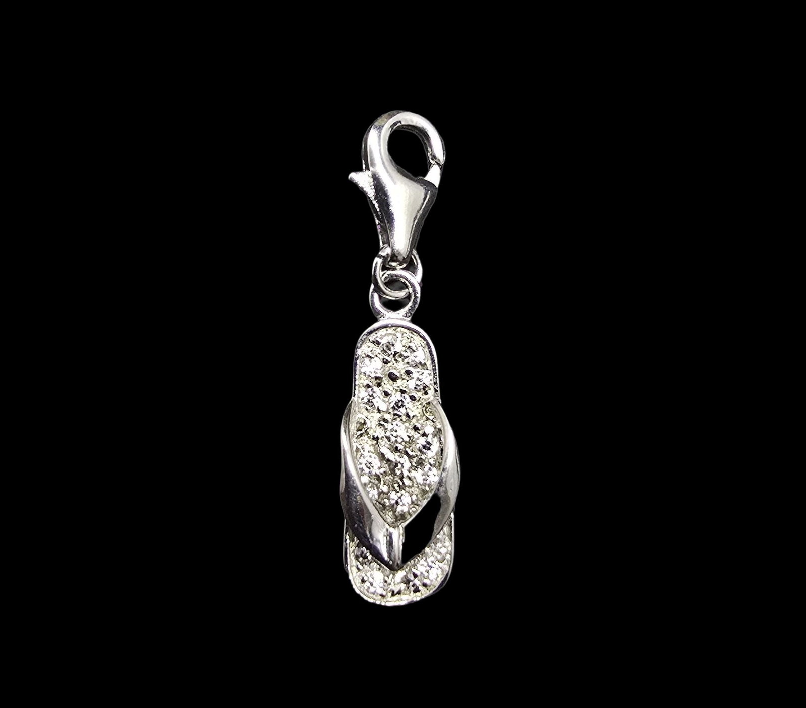 Whimsical Vintage Sterling Silver Flip Flop Pendant Charm /w Lobster Clasp: Very good vintage condition with minor patina according to age. Measures approx. 1/2" long and 1/2" wide and weighs ca. 2 grams. Marked for Sterling Silver.
