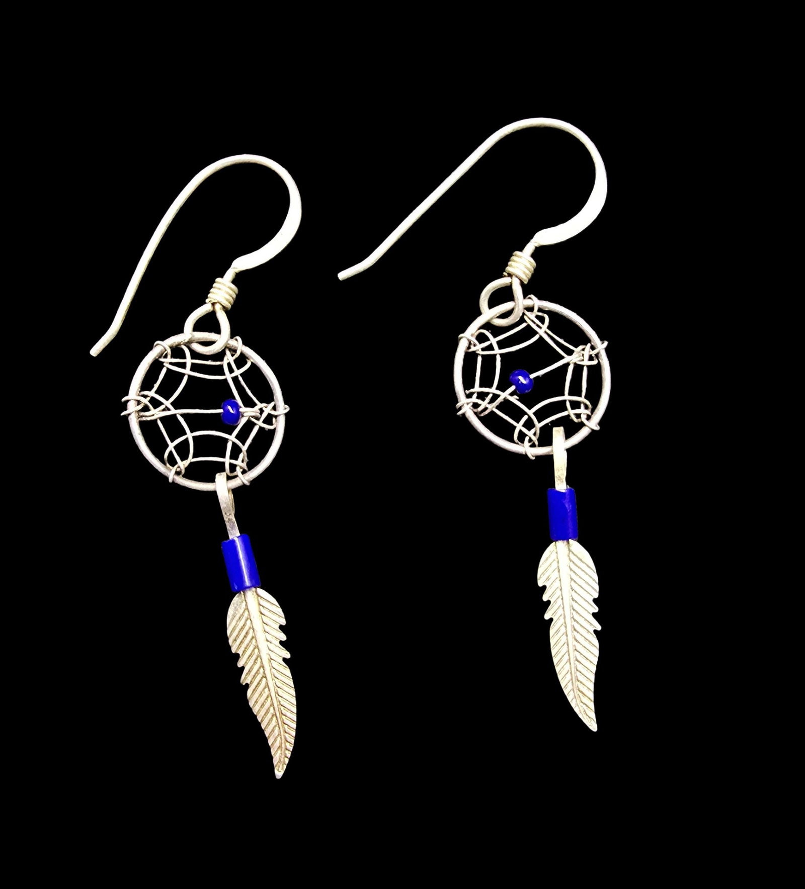 Beautiful Vintage Native American Sterling Silver Dreamcatcher Earrings: Very good vintage condition with minor patina according to age. Weighs ca. 1 gram. Tested for Sterling Silver.