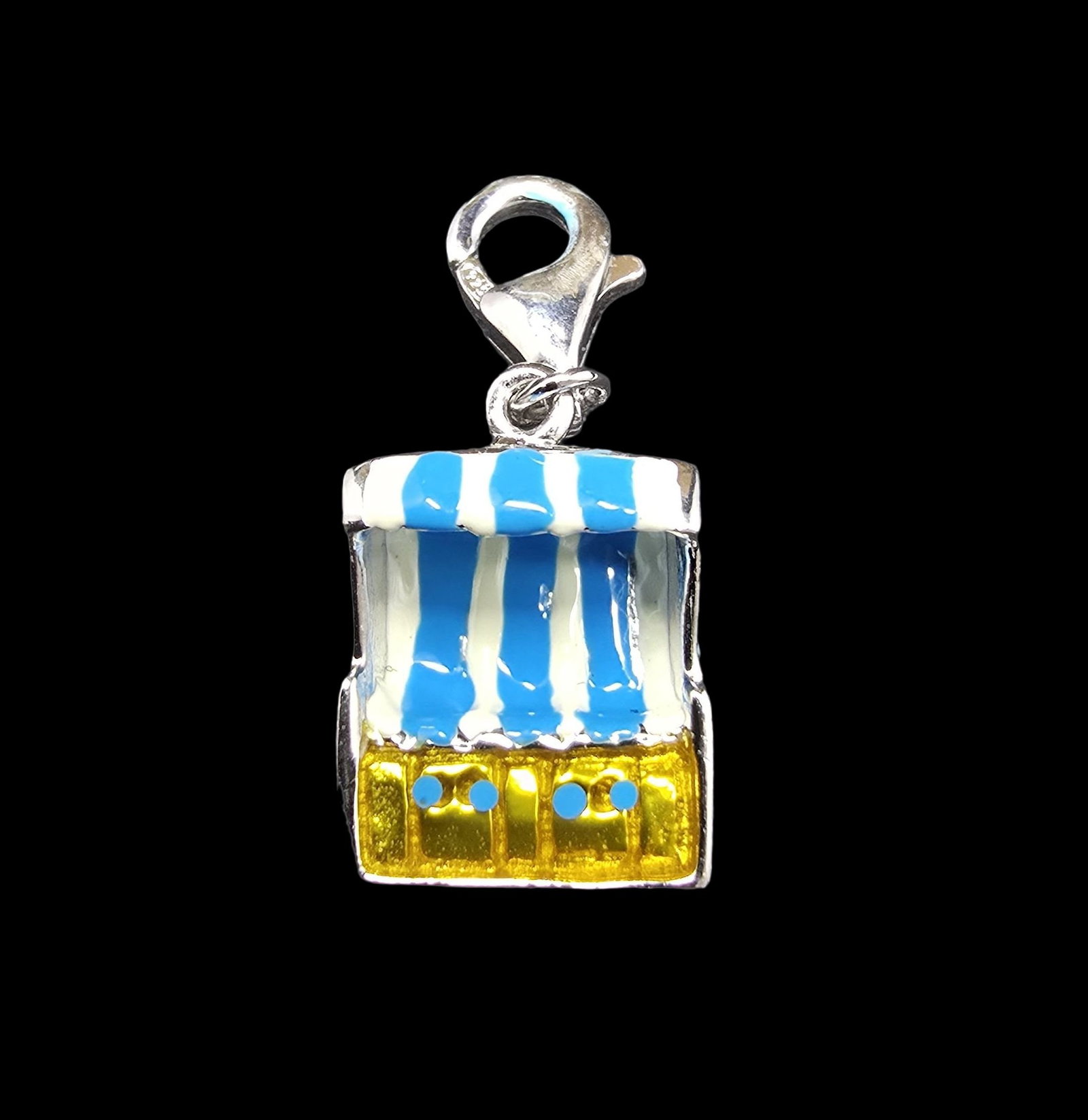 Unusual & Whimsical Vintage Sterling Silver Blue & White Beach Chair Pendant: Very good vintage condition with minor patina according to age. Measures approx. 1/2" long and 1/2" wide and weighs ca. 2 grams. Marked for Sterling Silver.