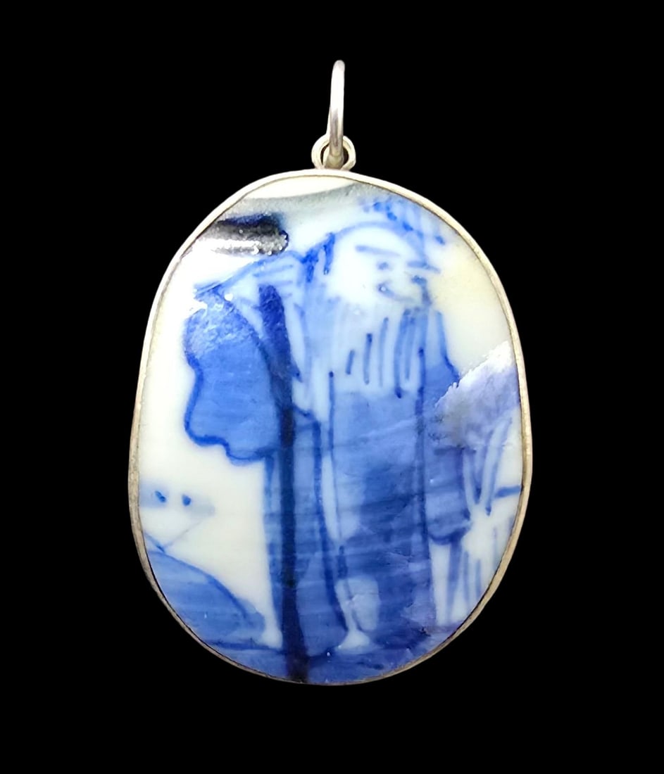 Gorgeous Antique Sterling Silver & Handpainted Blue Asian Porcelain Pendant: Very good antique condition with minor patina according to age. Measures approx. 1 1/2" long x 1" wide and weighs ca. 5 grams. Marked for Sterling Silver.