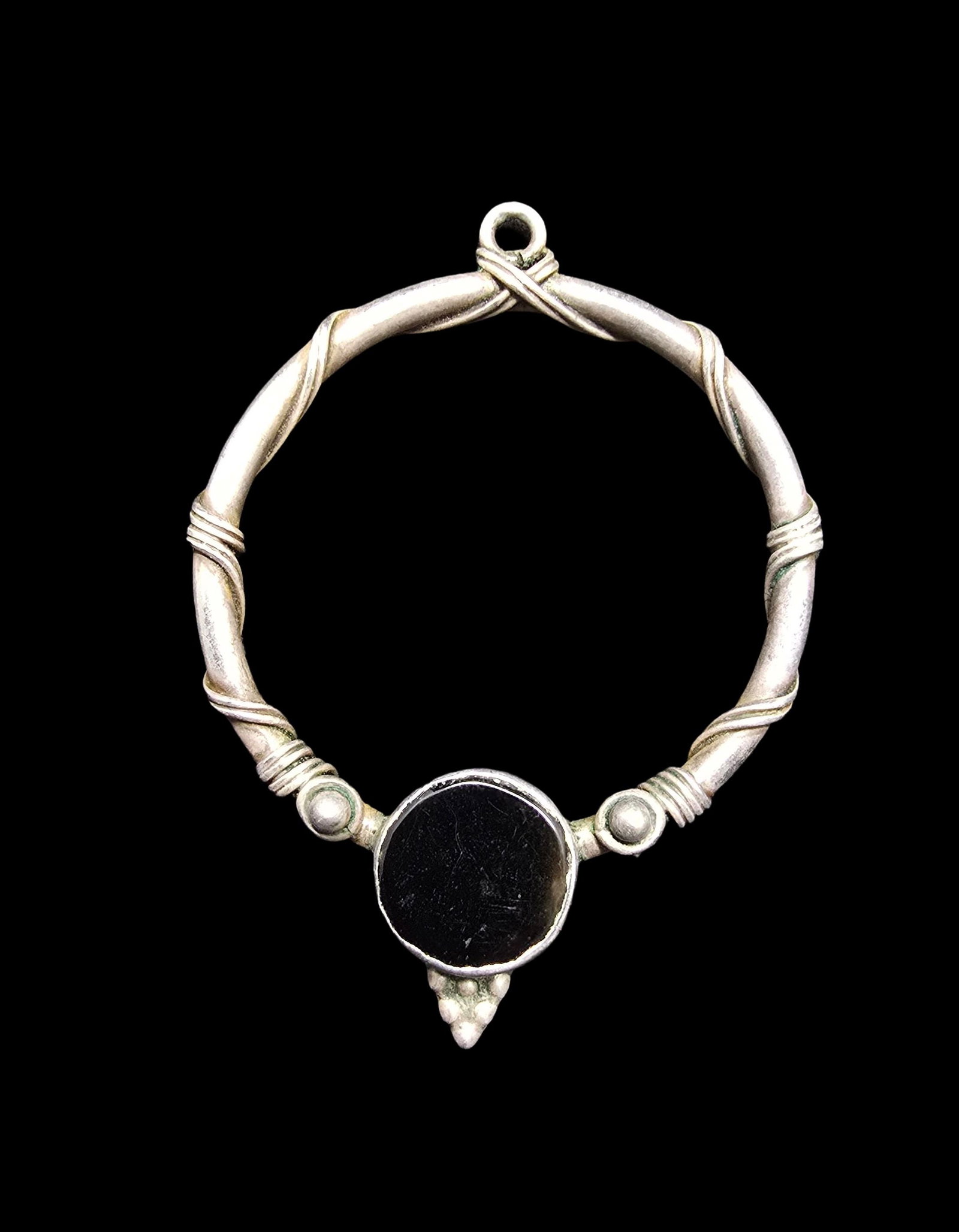 Unusual Vintage Sterling Silver & Black Gemstone Pendant: Very good vintage condition with minor patina according to age. Measures approx. 1 1/2" wide and weighs ca. 6 grams. Marked for Sterling Silver.