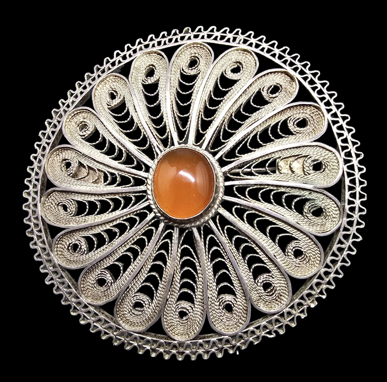 Gorgeous Ornate Vintage Israeli Sterling Silver & Carnelian Filigree Designer Pin Brooch: Very good vintage condition with minor patina according to age. Measures approx. 2 1/2" long and 2 1/2" wide and weighs ca. 13 grams. Marked for Sterling Silver.