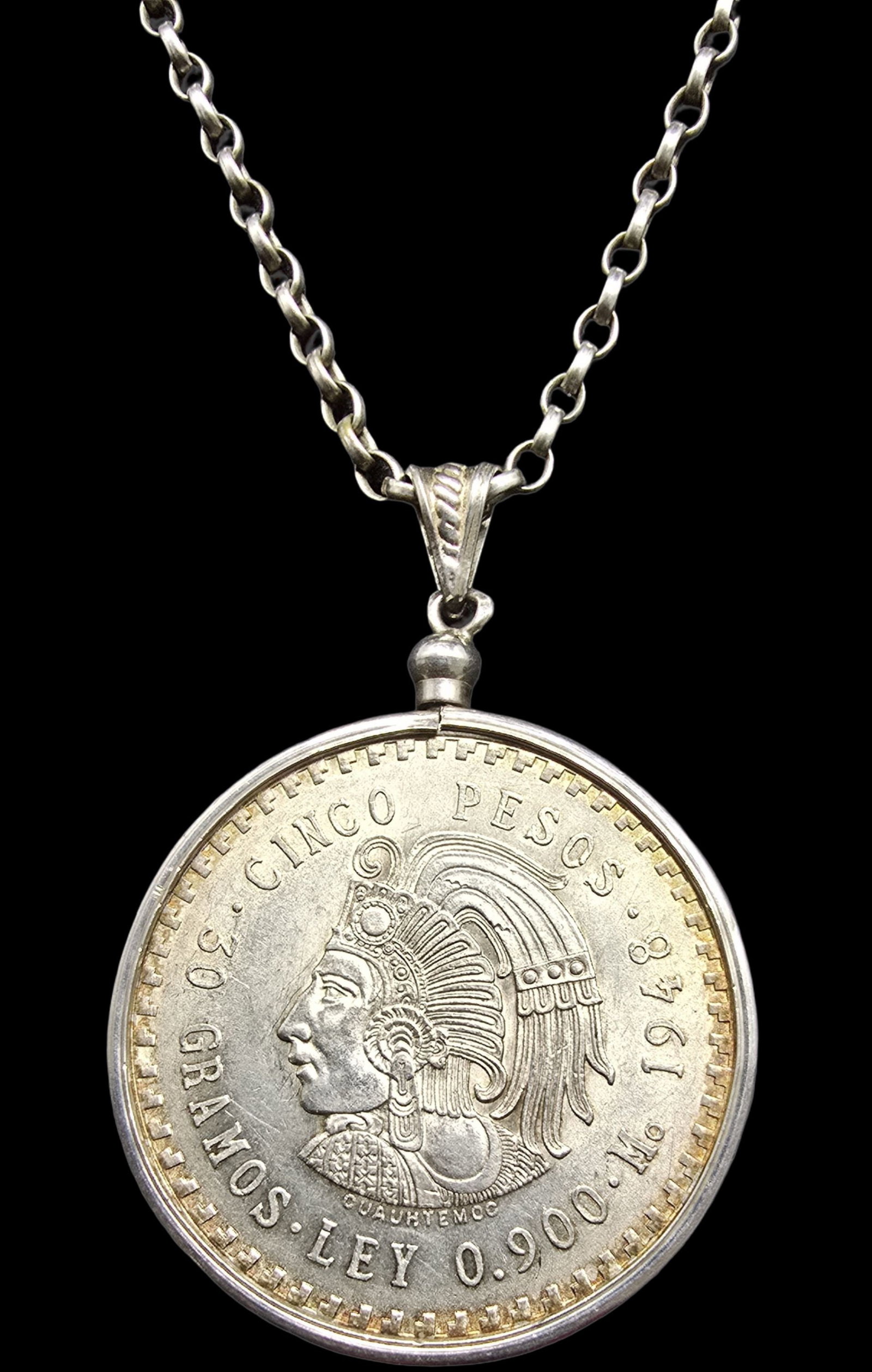 Vintage Sterling Silver Necklace /w 1948 Mexico King Cuauhtemoc 5 Pesos Silver Coin Pendant: Very good vintage condition with minor patina according to age. Pendant measures approx. 3" wide and total weight is ca. 47 grams. The necklace is approx. 30" long. Marked for Sterling Silver and 900 