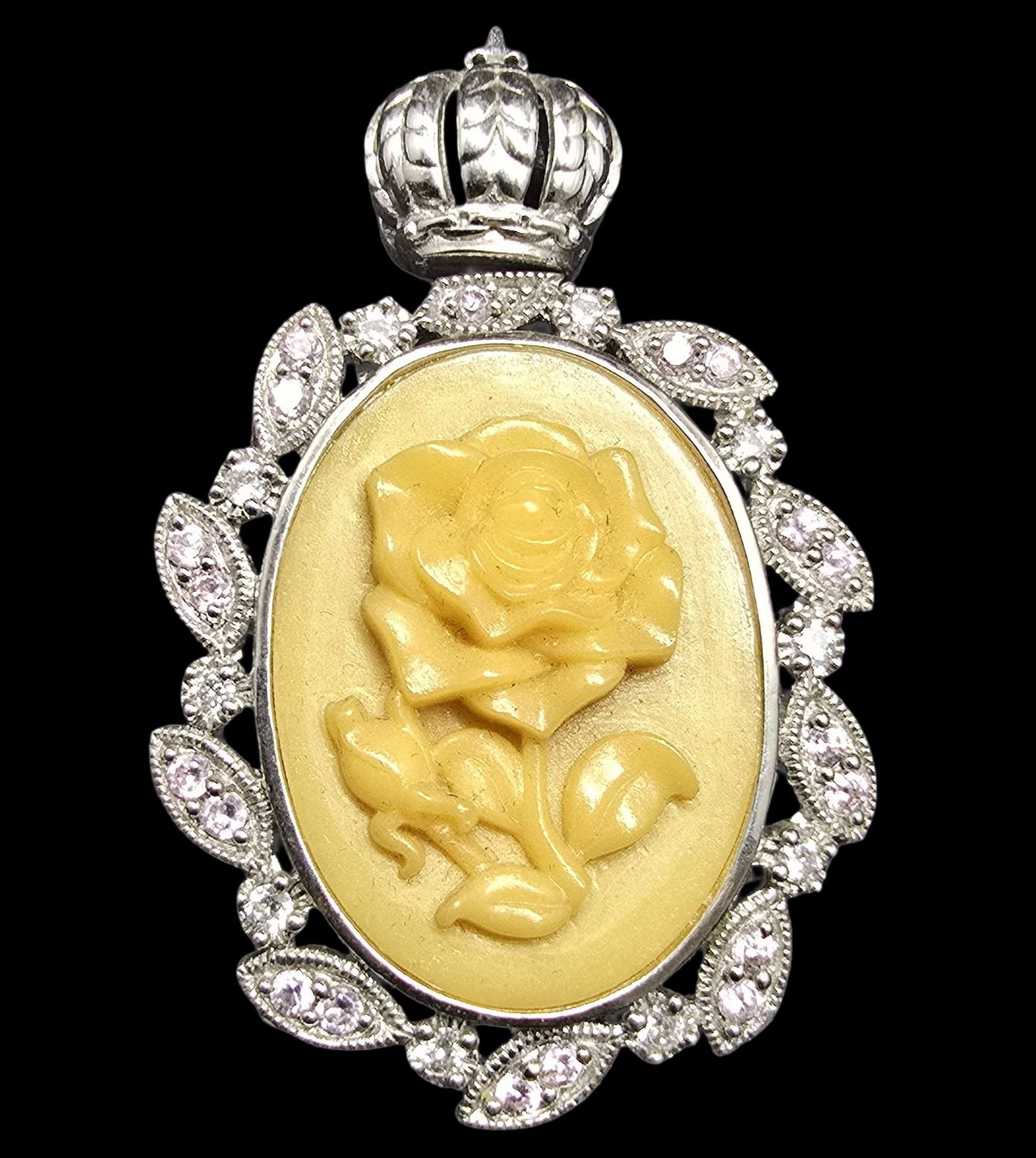 Beautiful POMPOOS European Sterling Silver, Clear Rhinestone & Cameo Designer Pendant: Very good vintage condition with minor patina according to age. Measures approx. 1" wide and weighs ca. 18 grams. Marked for Sterling Silver & POMPOOS.