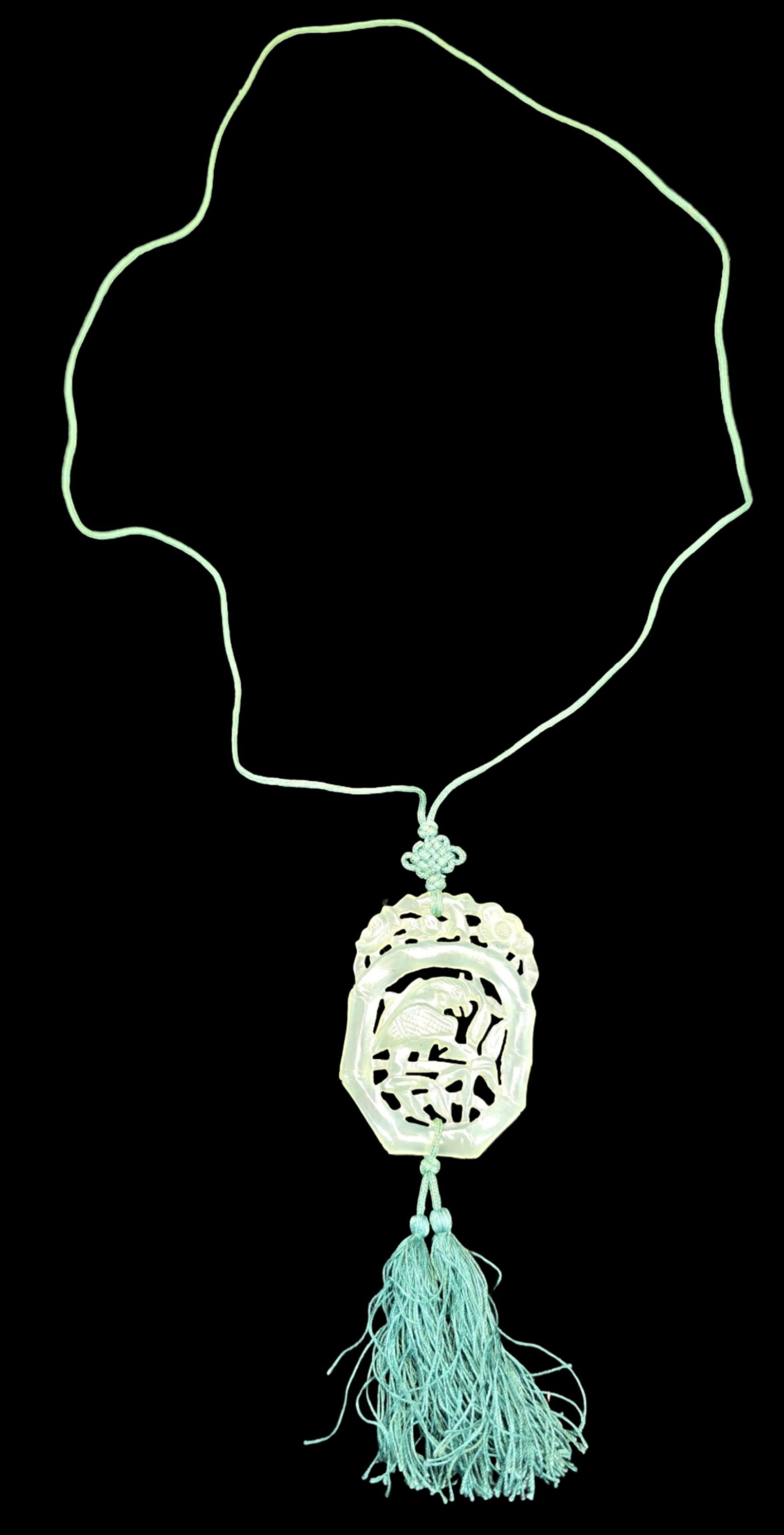 Ornate Vintage Hand Carved Jade Pendant Necklace: Very good vintage condition with minor patina according to age. Measures approx. 17" long and weighs ca. 19.5 grams.