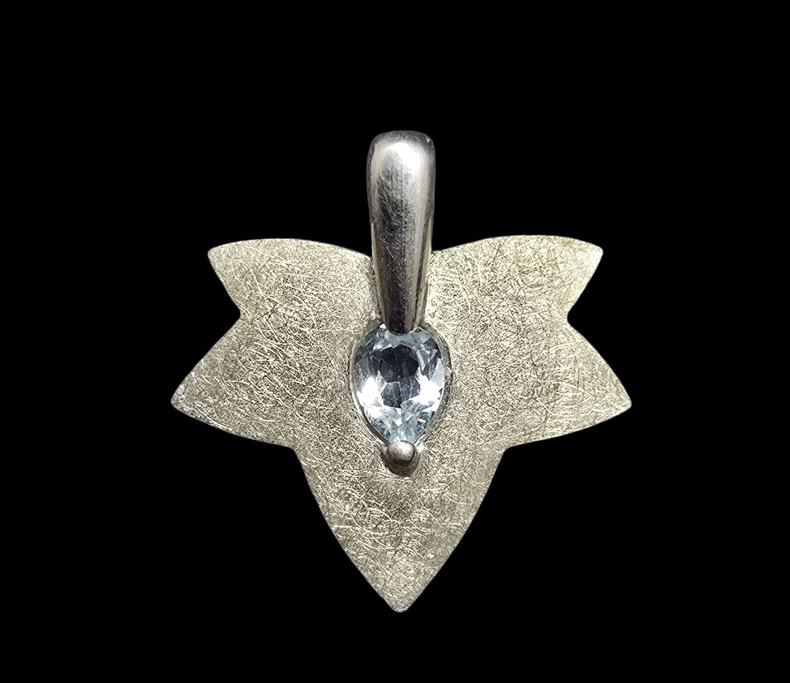 Unusual Vintage Sterling Silver & Blue Gemstone Leaf Shaped Pendant Charm: Very good vintage condition with minor patina according to age. Measures approx. 1" wide and weighs ca. 4.5 grams. Marked for Sterling Silver.