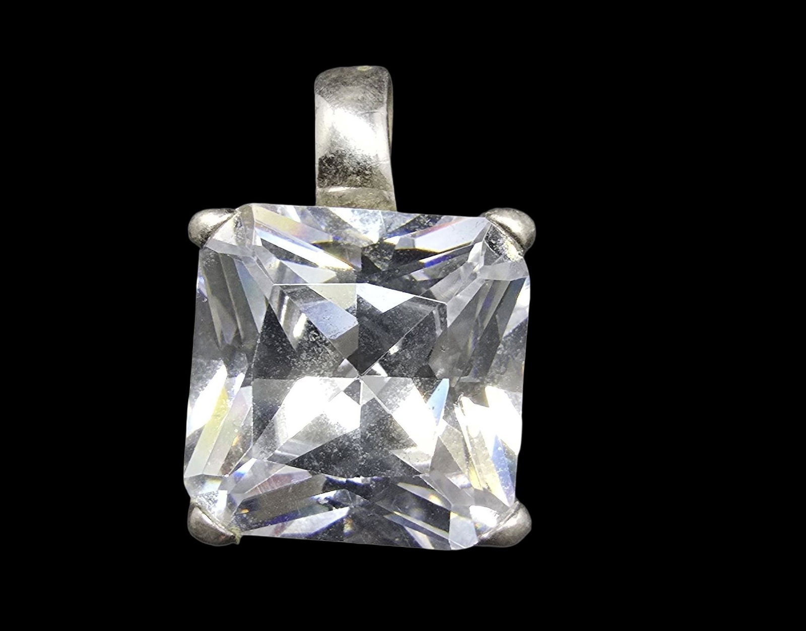 Gorgeous Vintage Sterling Silver & Clear Rhinestone Pendant Charm: Very good vintage condition with minor patina according to age. Measures approx. 1" wide and weighs ca. 7.5 grams. Marked for Sterling Silver.