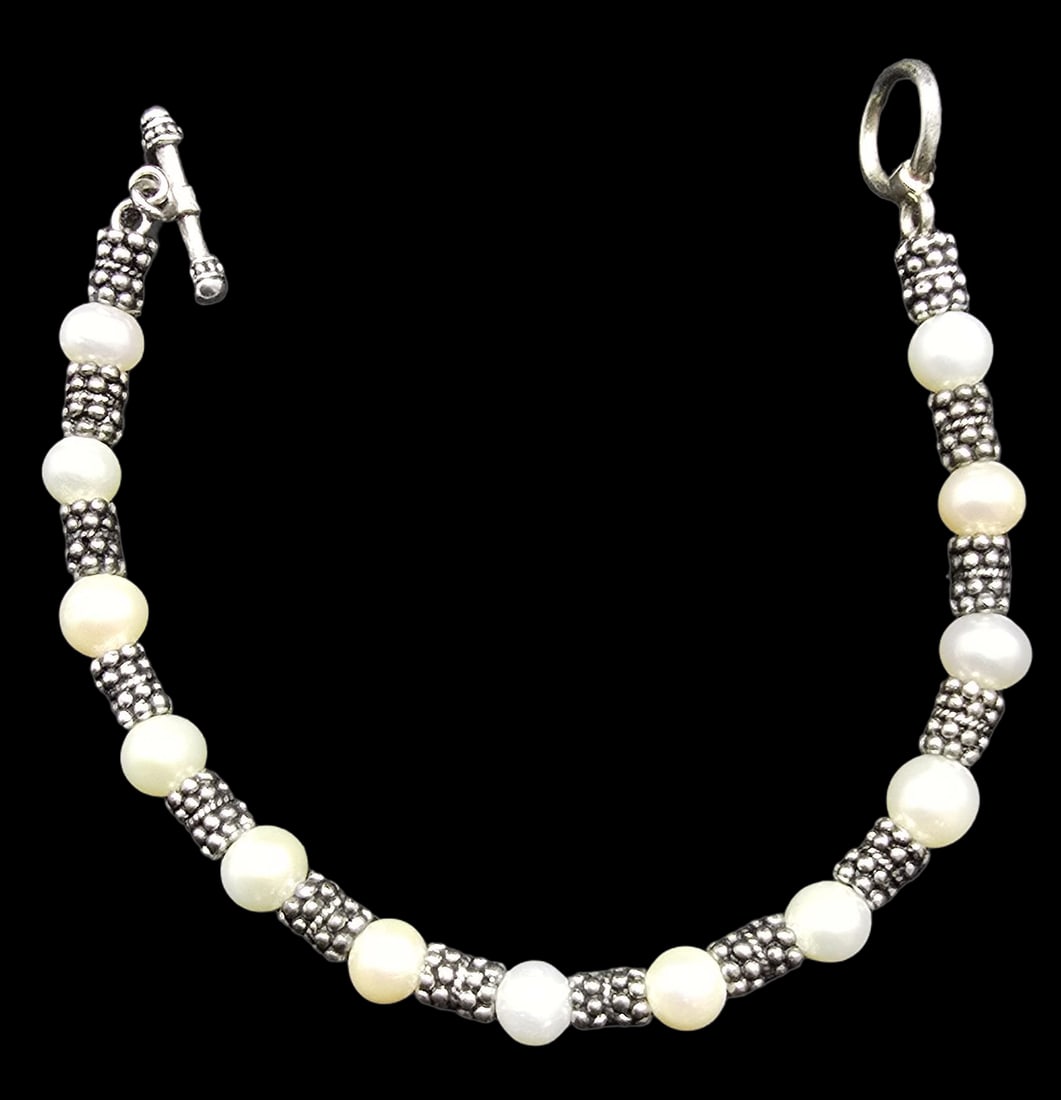 Stunning Ornate Vintage Sterling Silver & Pearls Bracelet: Very good antique condition with minor patina according to age. Weighs ca. 20 grams. Marked for Sterling Silver.