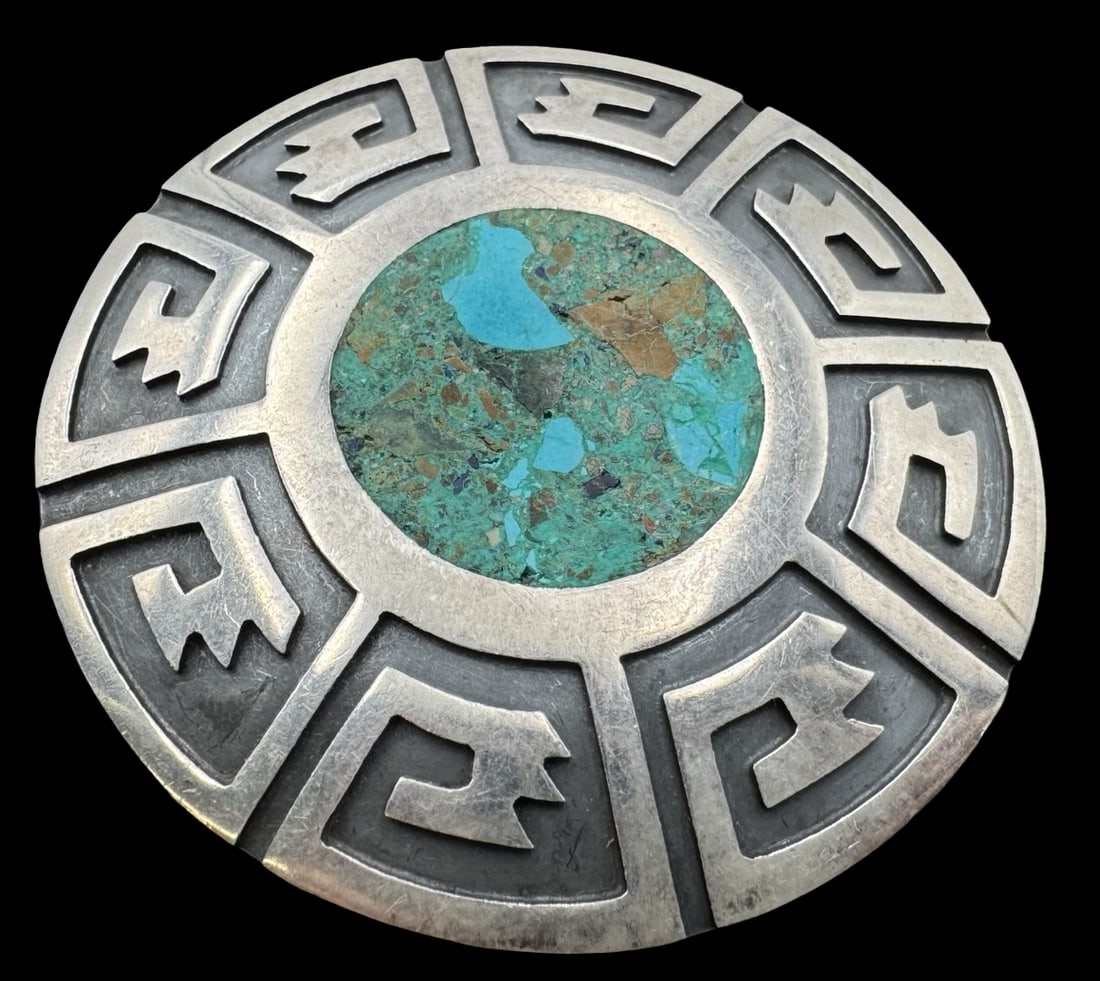 Beautiful Vintage Mid-Century TAXCO MEXICO Sterling Silver & Turquoise Mosaic Designer Brooch: Very good vintage condition with minor patina according to age. Measures approx. 2 1/4" in diameter and weighs ca. 22.6 grams. Marked for Sterling Silver. & TAXCO MEXICO; signed.
