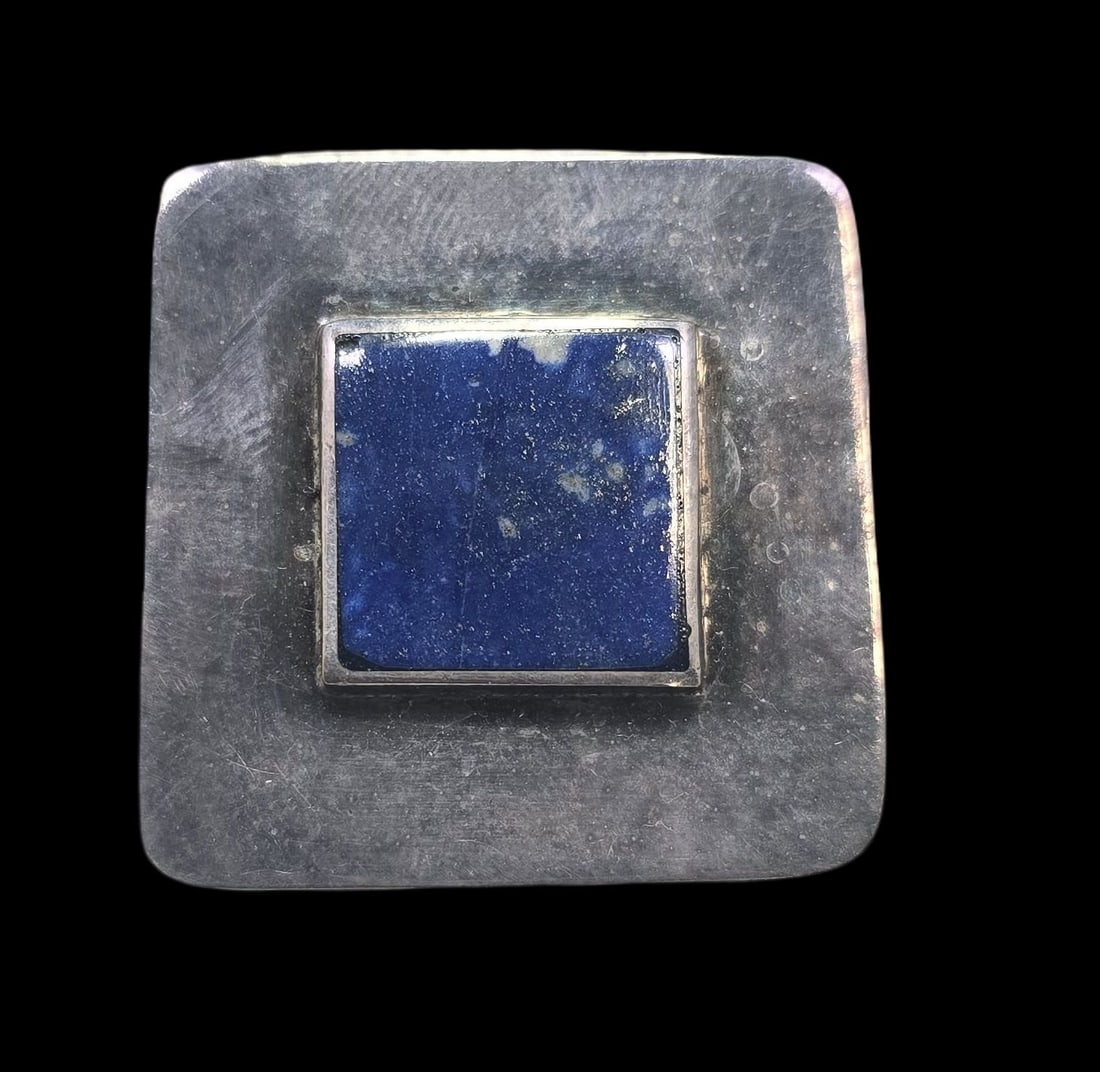 Vintage Mid-Century Modern Sterling Silver & Blue Gemstone Brooch: Very good vintage condition with minor patina and wear according to age. Measures approx. 1" high x 1" wide and weighs ca. 8 grams. Marked for Sterling Silver..