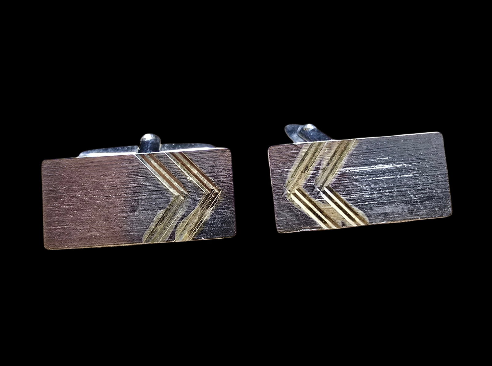 Stylish Vintage Mid-Century Sterling Silver Cufflinks: Very good vintage condition with minor patina according to age. Measures approx. 1" wide and weighs ca. 7.5 grams. Marked for Sterling Silver.