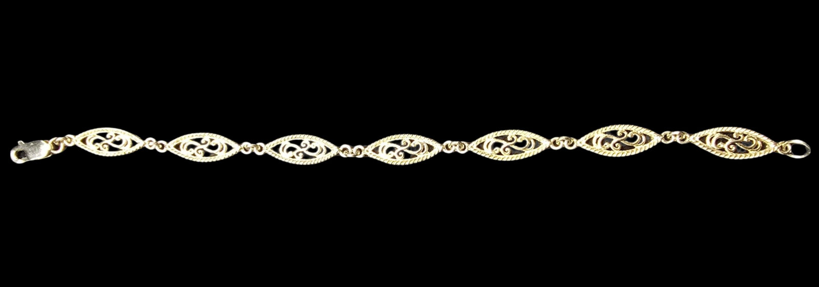 Beautiful Ornate Vintage Gilt Sterling Silver Filigree Bracelet: Very good vintage condition with minor patina according to age. Weighs ca. 7 grams. Marked for Sterling Silver.
