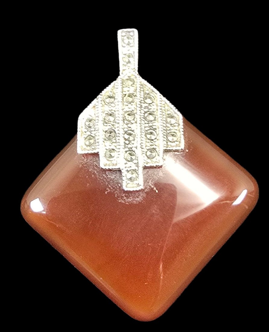 Vintage Sterling Silver, Marcasite & Red Gemstone Pendant: Very good vintage condition with minor patina and wear according to age. Measures approx. 2" high x 1 1/2" wide and weighs ca. 12 grams. Marked.