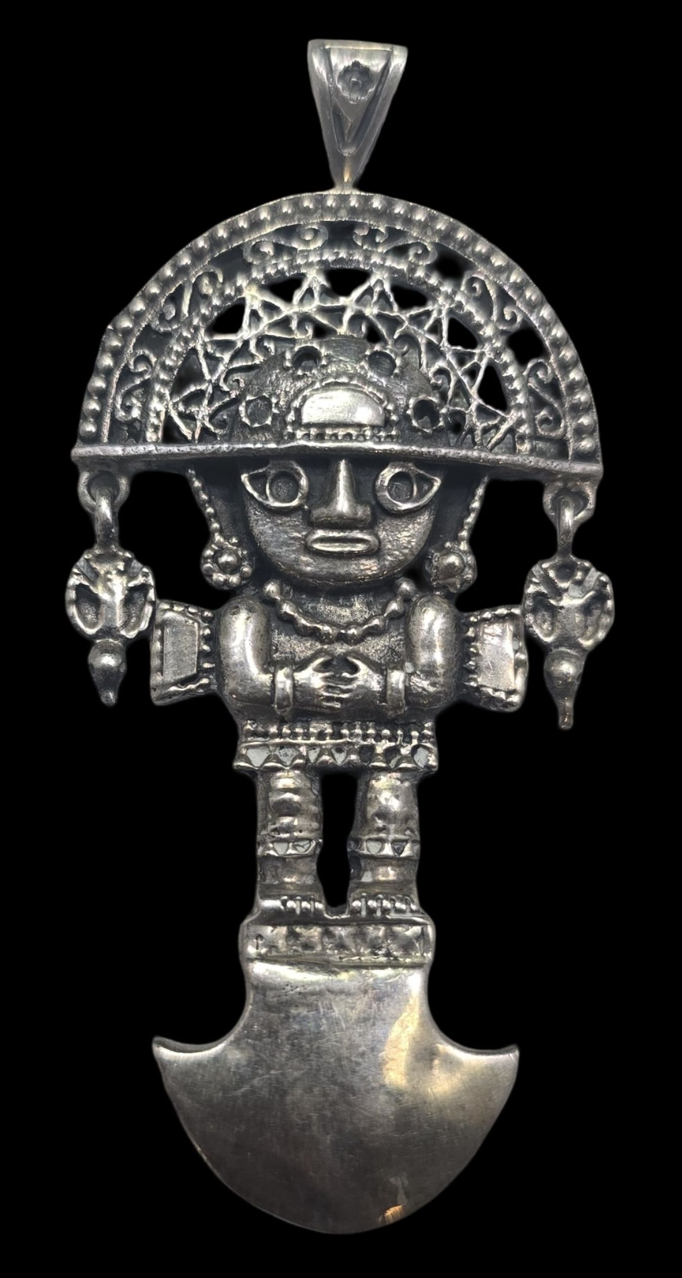 Vintage Pre-Columbian Sterling Silver Pendant: Very good vintage condition with minor patina and wear according to age. Measures approx. 2 1/2" high x 1 1/2" wide and weighs ca. 23.5 grams. Tested for Sterling Silver.