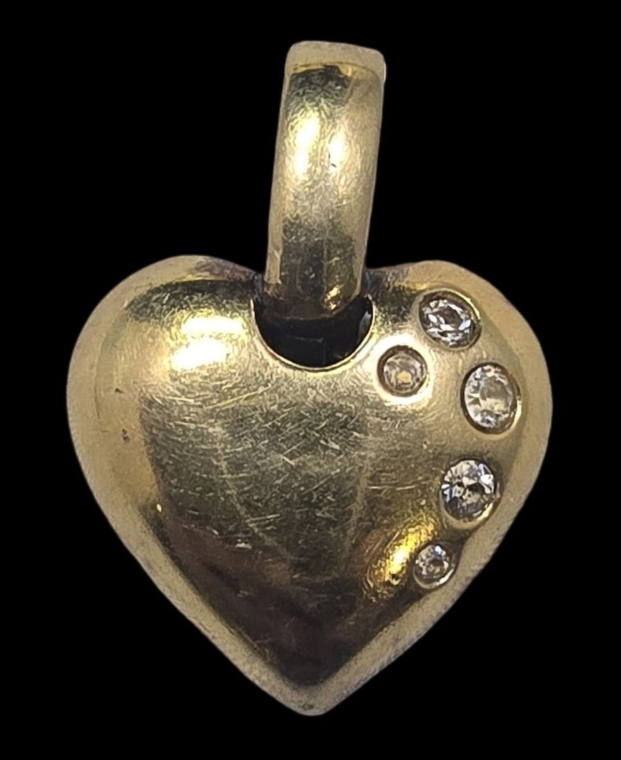 Vintage Gilt Sterling Silver & Rhinestone Clip-On Pendant: Very good vintage condition with minor patina and wear according to age. Measures approx. 1" high and weighs ca. 5.5 grams. Marked for Sterling Silver..