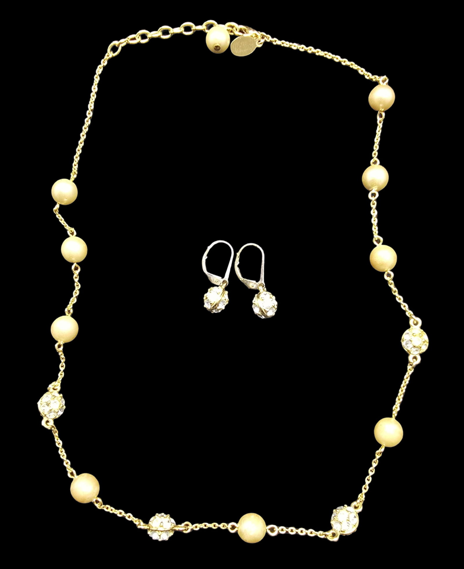 Gorgeous Vintage NOLAN MILLER Costume Jewelry Faux Pearl & Clear Rhinestones Necklace & Earrings Set: Very good antique condition with minor patina according to age. Necklace measures approx. 18" long and total weight is ca. 18 grams. Marked for NOLAN MILLER.